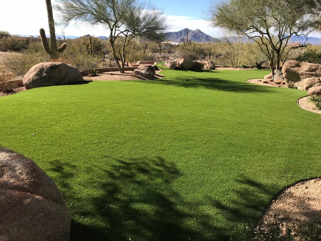 Artificial Grass and Rock Landscaping The Perfect Combination for a Low-Maintenance and Aesthetic Outdoor Space